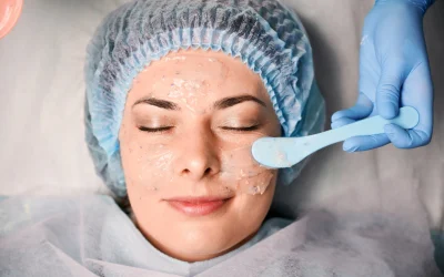 cosmetologist-hand-applying-cosmetic-mask-on-woman-2026-01-07-00-59-46-utc